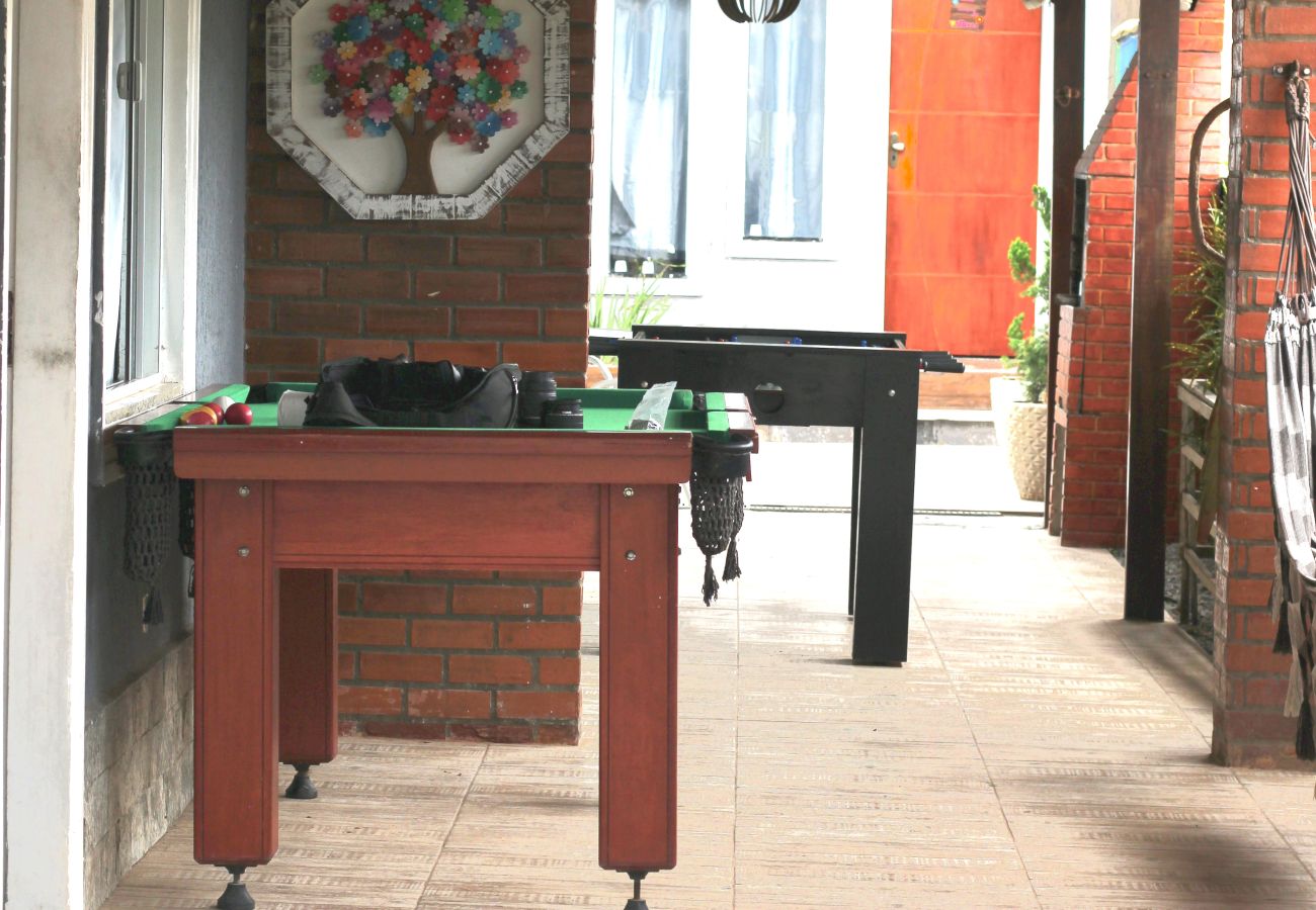 Rent by room in Cabo Frio - Pousada a 1 minuto da praia | UNR