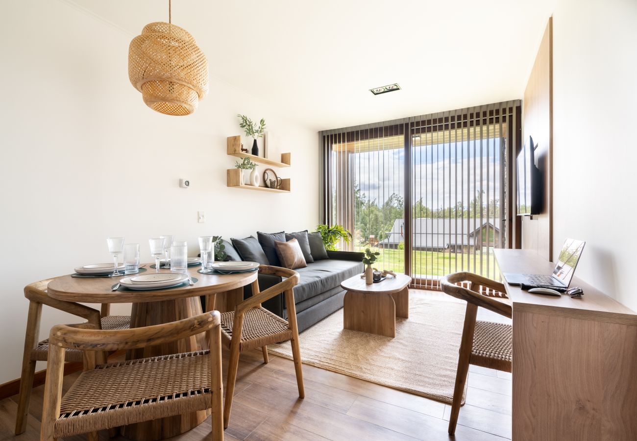 Apartment in San Carlos de Bariloche - Cozy Melipal Retreat | Garden, BBQ & Pool  